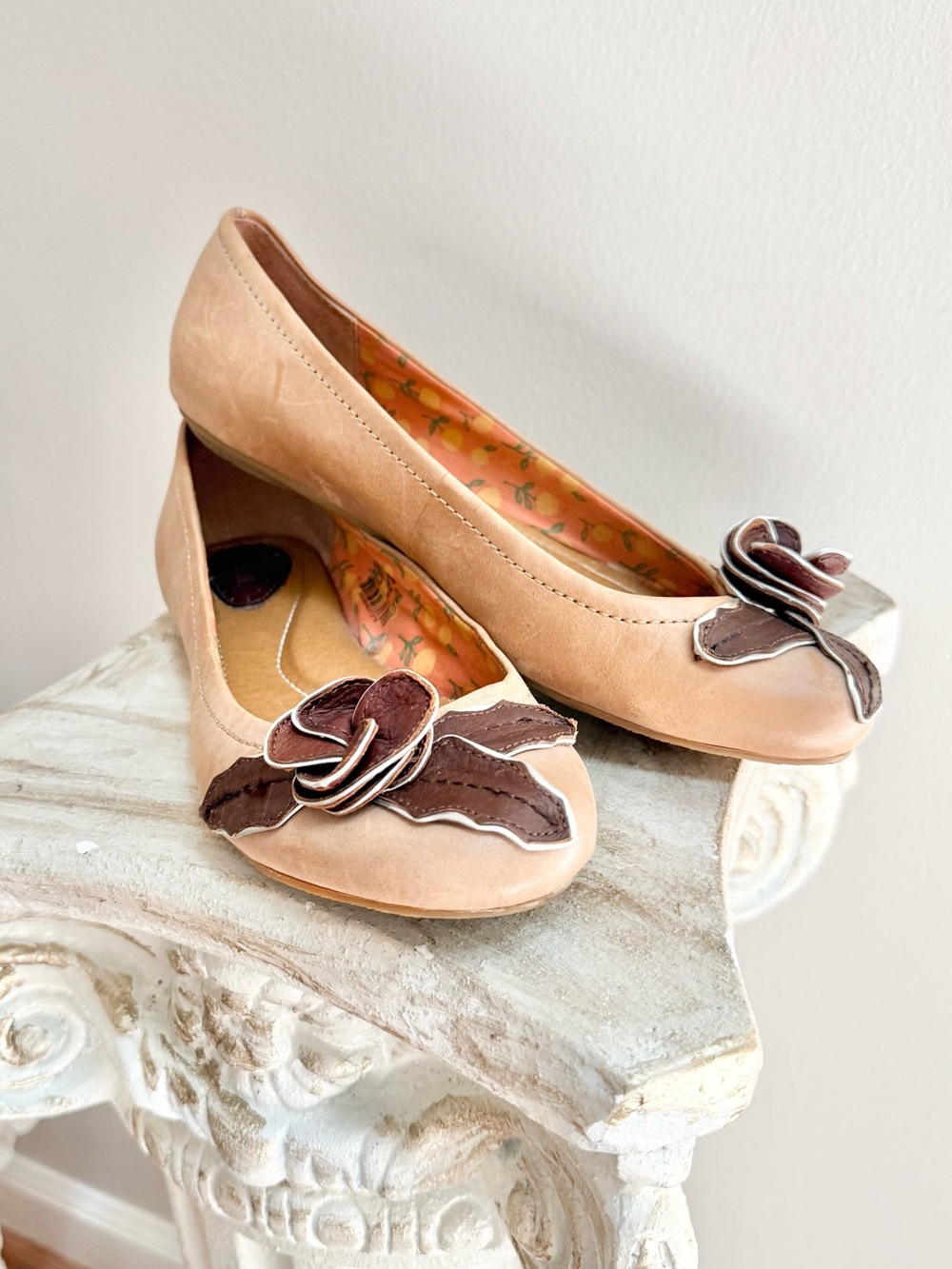 Fossil Tan Ballet Flats with Brown Flower Appliqué
